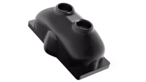 A smooth black molded plastic part with two circular openings on its top surface.