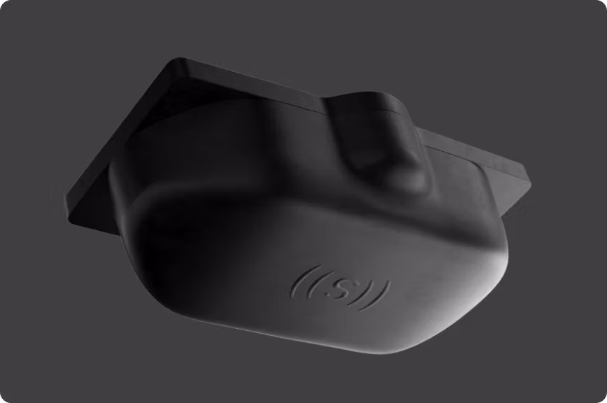 A black ultrasonic sensor with the Sensoneo ((S)) logo on its surface.