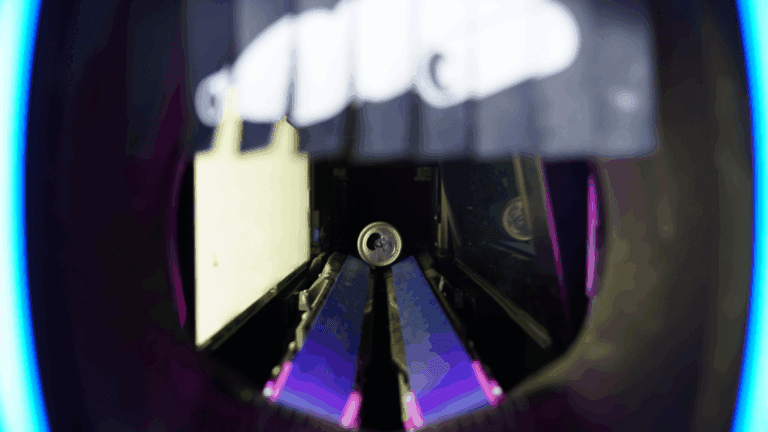 Interior of a reverse vending machine as a can moves inside.