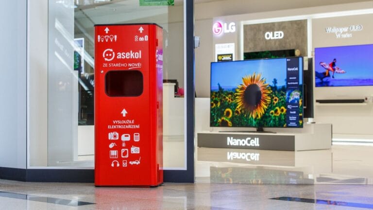 Bright red e-waste drop-off bin in a shopping mall.
