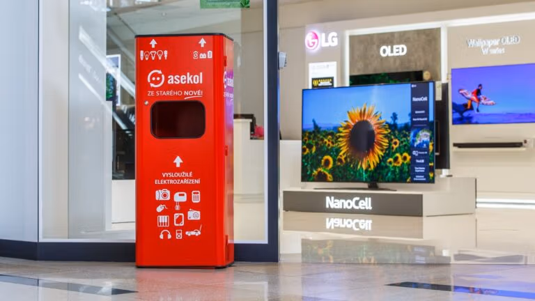 Bright red e-waste drop-off bin in a shopping mall.