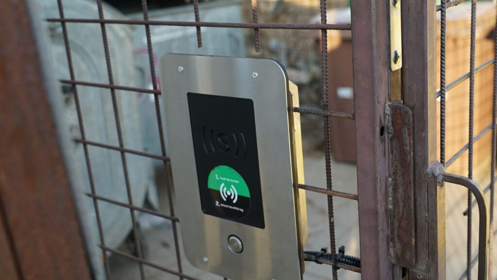RFID access panel on a metal gate.

