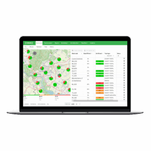 Laptop screen showing a waste-management dashboard with map pins and bin fill levels.