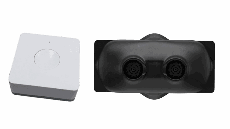 Two smart waste sensors: one compact white unit and one dual-sensor black unit.
