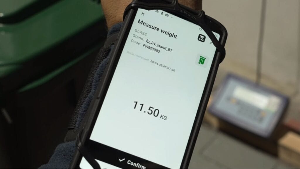 Mobile app displaying bin weight measurement of 11.50 kg.
