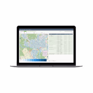 Laptop displaying a map-based waste management dashboard.