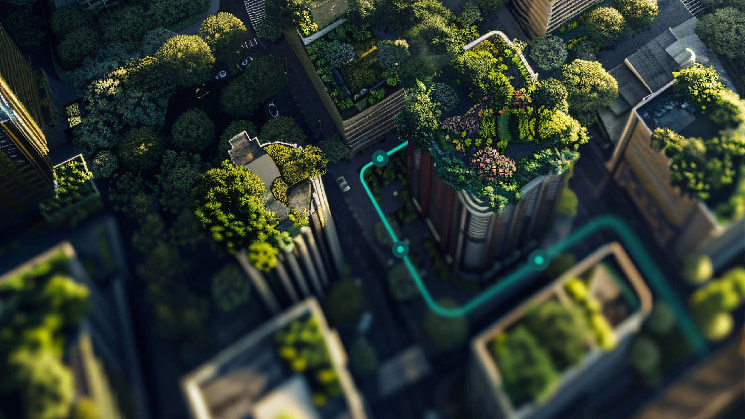 Aerial view of green, sustainable buildings with rooftop gardens.
